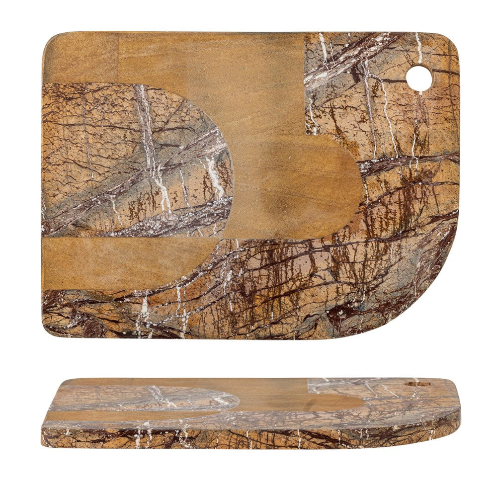 The Abrianna Cutting Board in marble combines functionality with natural aesthetics. It presents a unique pattern that mimics the grain of wood, adding a rustic charm.  Curved shaped detail.