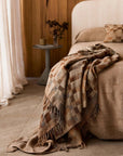 check pattern wool and silk throw in neutral beige tones.