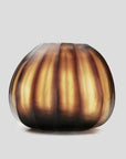 The Aura vase is mouth blown molten glass which is then hand carved to produce linear cuts making each piece totally unique.