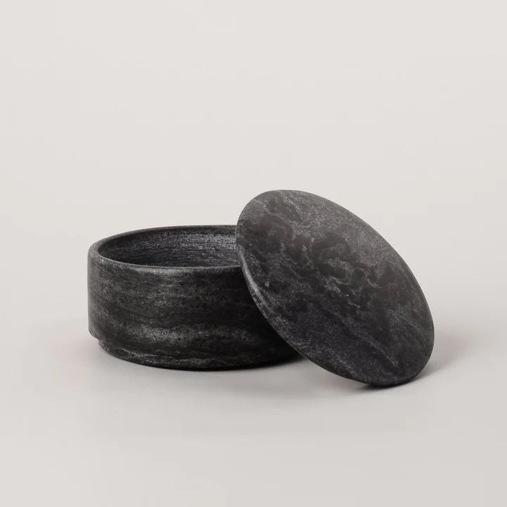 Our black marble canister bring essential storage and timeless style to your home interiors. Made from marble, this is the perfect canister to hide away small items and essentials. round with lid