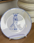 ceramic wall plate featuring blue cosmic owl by artist Nadia Robertson