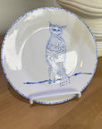 ceramic wall plate featuring blue cosmic owl by artist Nadia Robertson