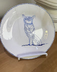 ceramic wall plate featuring blue cosmic owl by artist Nadia Robertson