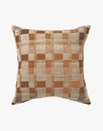 Checkered pillow with brown and beige pattern on a white background