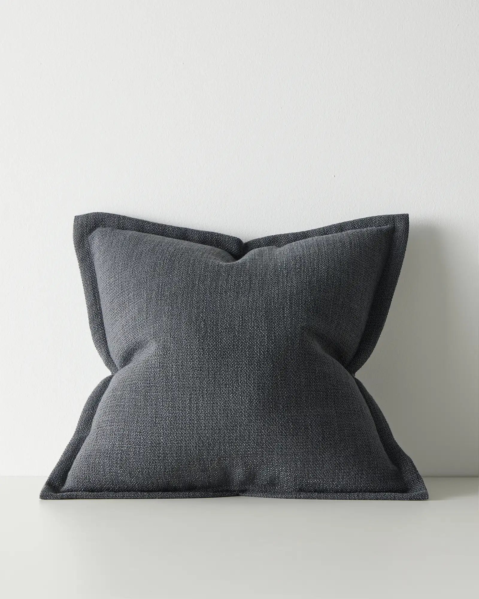 Dark gray textured pillow with flange edge