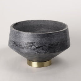 Beauty meets craftsmanship in this grey marble decorative bowl featuring a brass footed base.