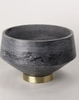Beauty meets craftsmanship in this grey marble decorative bowl featuring a brass footed base.