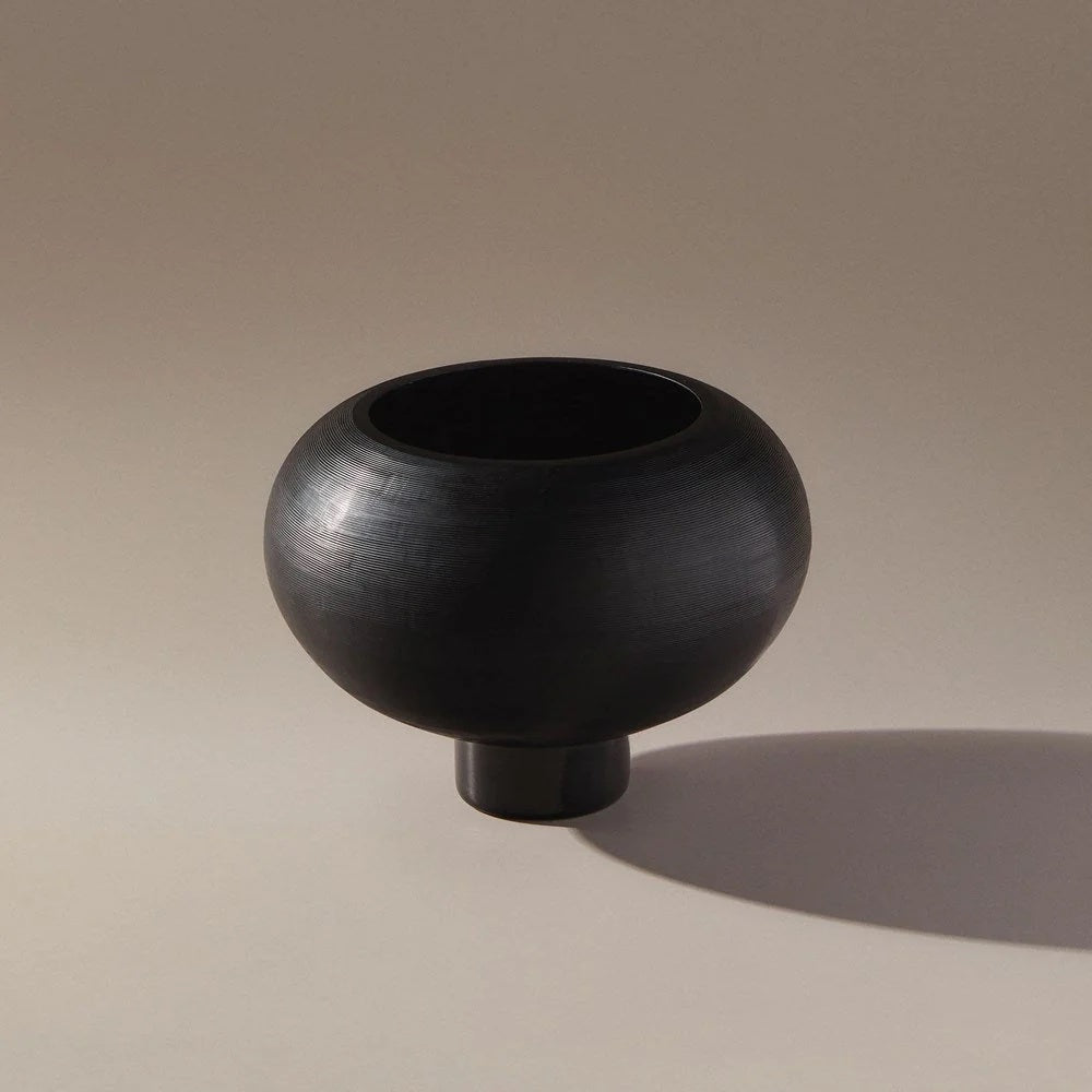 Black textured and footed glass vase
