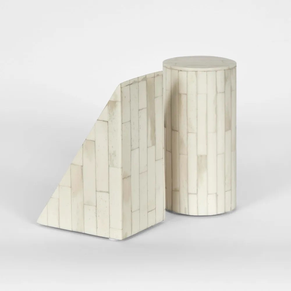 The bold geometric forms covered in creamy hues consisting of carved bone pieces create a striking accent to keep your books in order. Handcrafted from ethically sourced buffalo bones in India, each piece is unique.