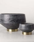 Beauty meets craftsmanship in this grey marble decorative bowl featuring a brass footed base.