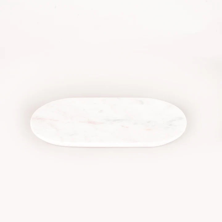 this marble oval tray will add a stylish touch to suit your kitchen, bathroom or bedroom space. Crafted from white marble, It's a beautiful decorative piece that is sure to elevate your styling.