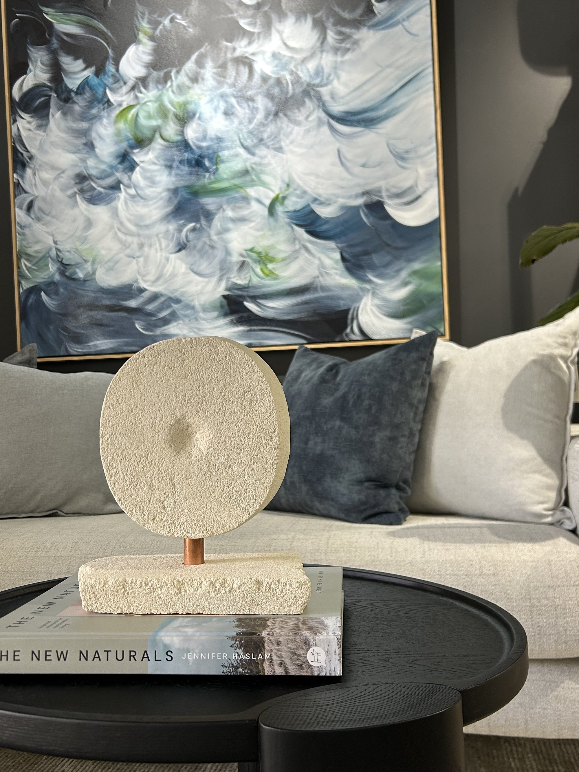 Handmade designer artisan piece made of limestone.  
This graceful sculptural piece is a contemporary take on the protective evil eye. It will bring good luck and protect from ill will.