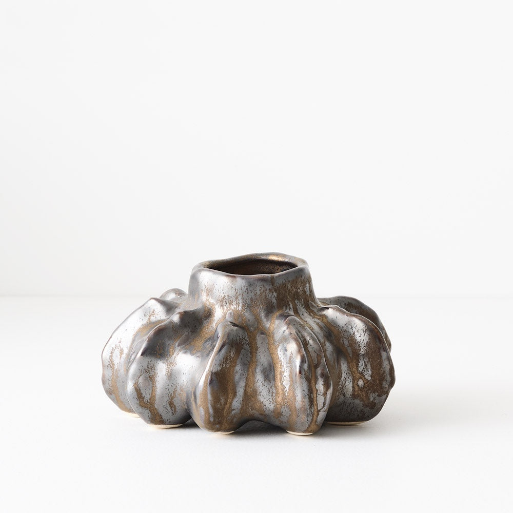 Their abstract coral-like shapes add an artistic touch to any space, enhancing both aesthetics and functionality. Copper glaze finish.