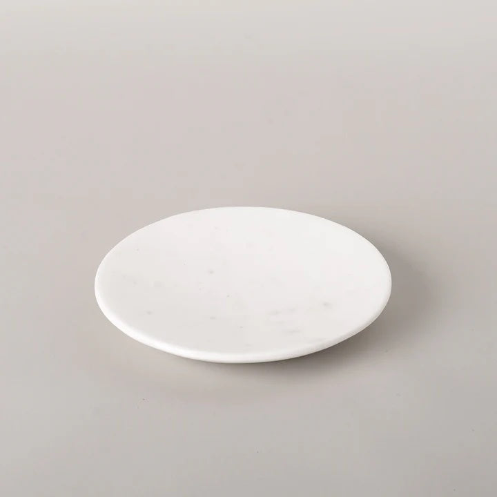 The white round marble soap dish is Ideal for displaying your favourite bathroom hand soap bars. It has a classic round design that gives it a stylish appearance.
