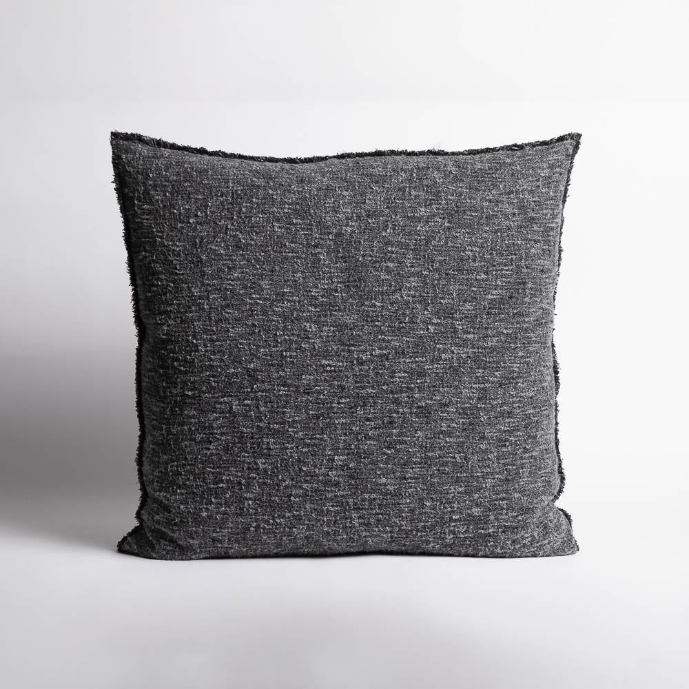 The Sora Cushion, named after the Japanese word for "sky," captures the beauty of the midnight sky with a blend of deep blue tones and off-white yarns. 50cm square