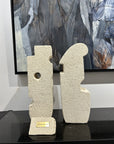 Handmade designer artisan piece made of limestone. These charming sculptural pieces are a balanced duality. A mixture of soft and sharp intertwined amongst each other, to show that each personality can, have it all.