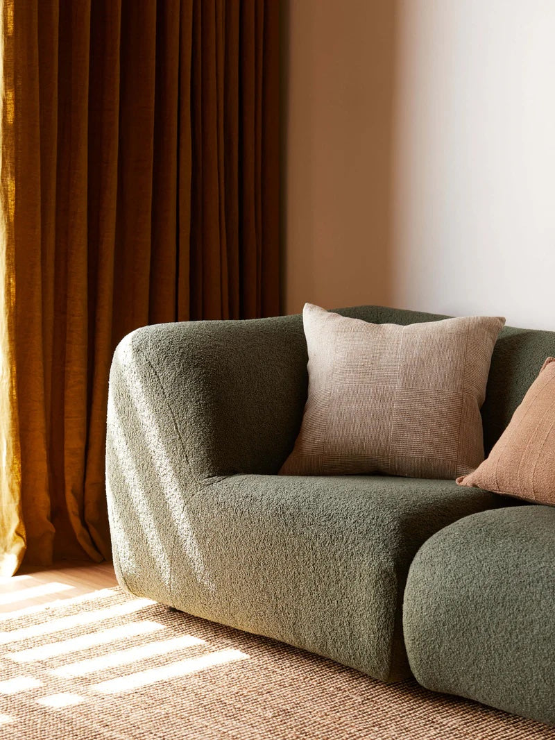 beige cushion with  textured check pattern