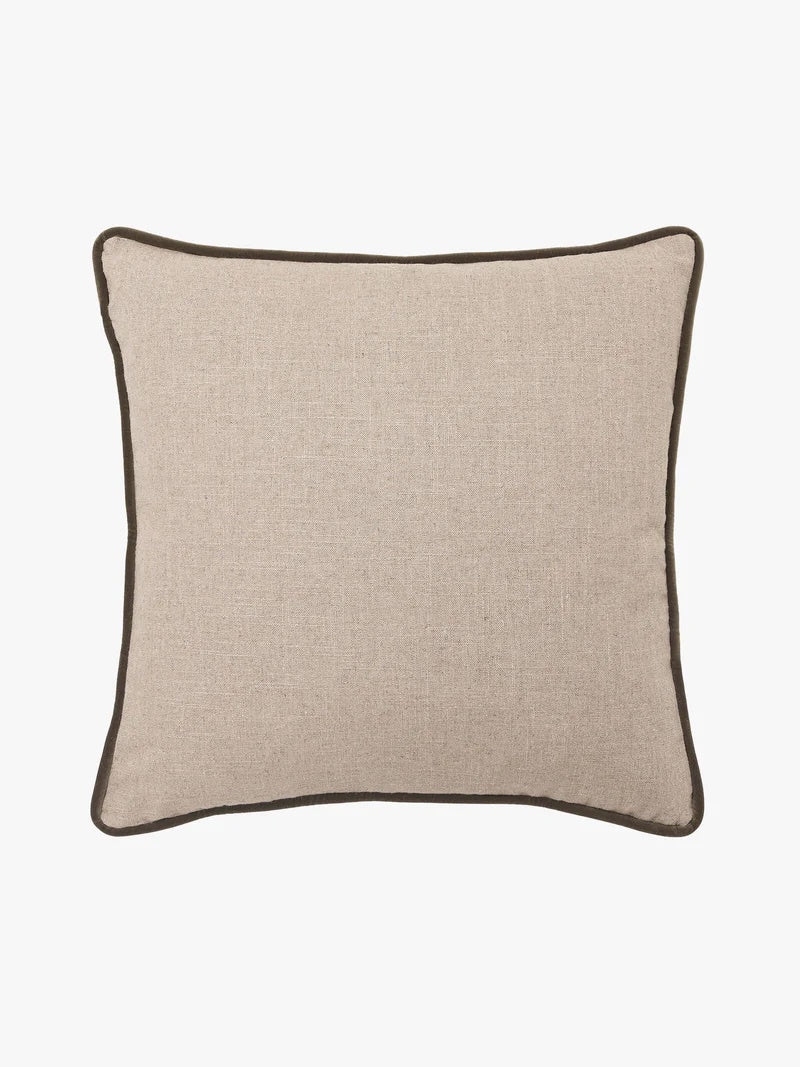 Beige cushion with a piped olive green edge