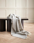 striped silver blanket with white fringe