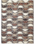 Tribe Home Orissa rug in earthy tones with half moon pattern