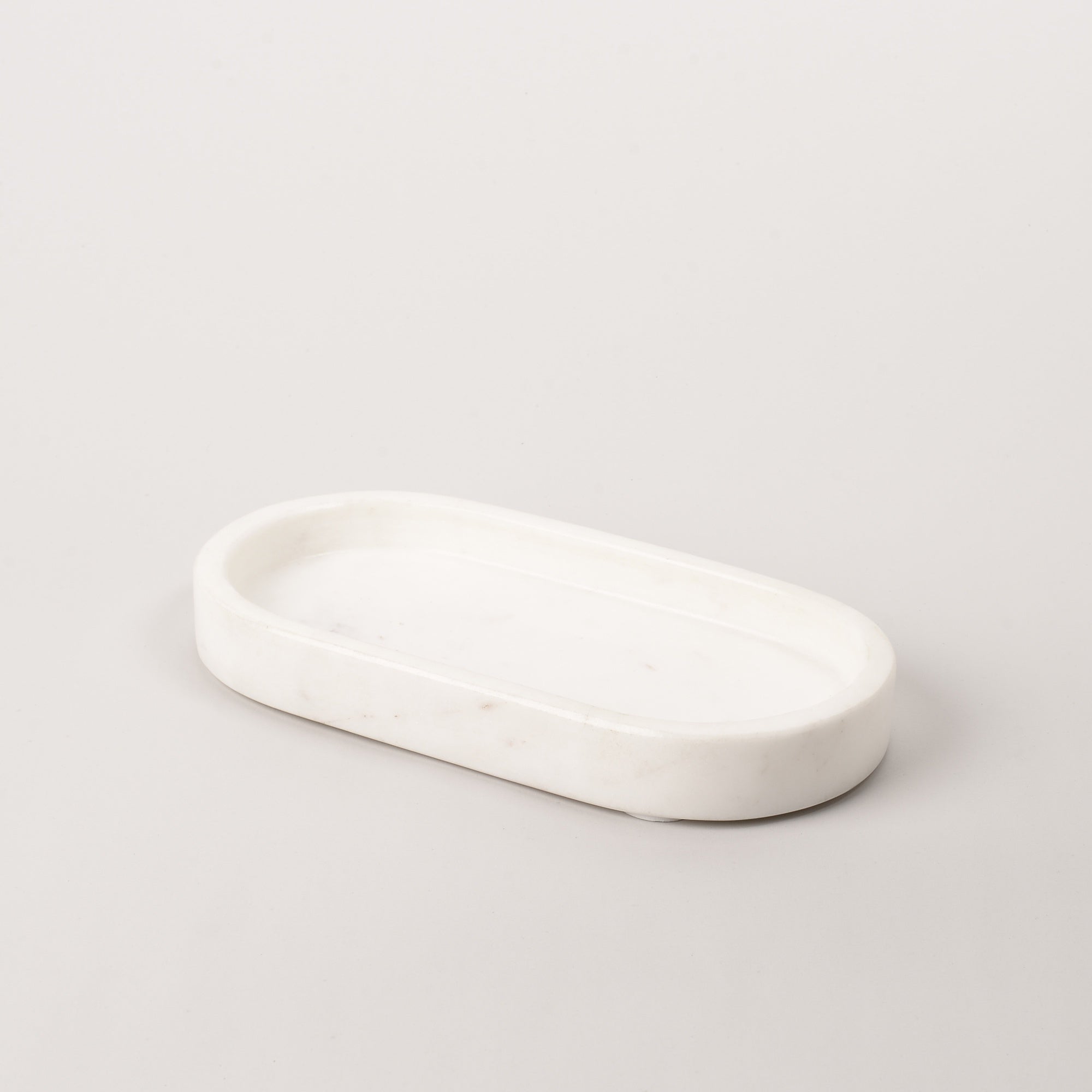 Crafted from white marble, It's a beautiful decorative piece that is sure to elevate your styling. Ideal for displaying bathroom hand soap and hand cream pump packs.