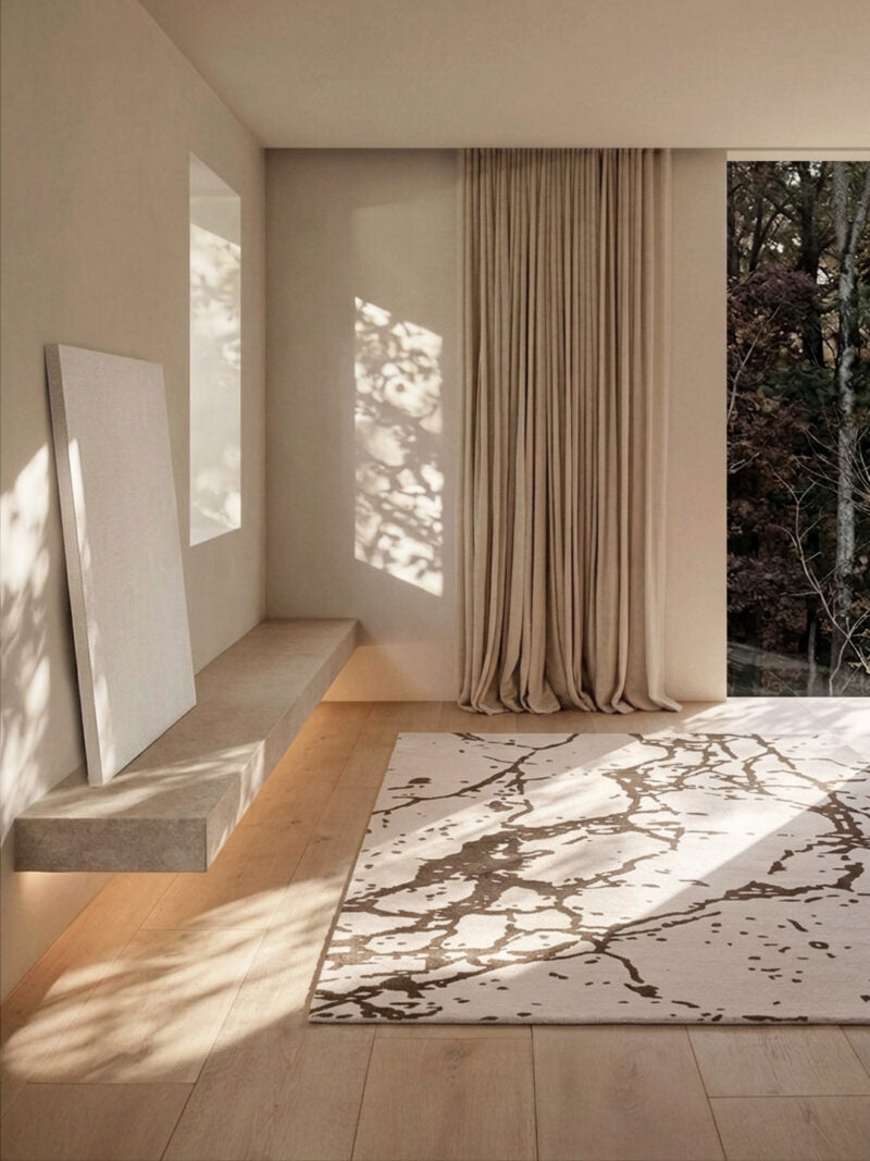 the Cameo Rug features an organic composition of flowing lines and tonal hues
