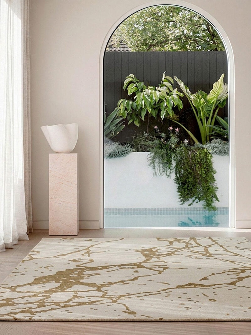 the Cameo Rug features an organic composition of flowing lines and tonal hues