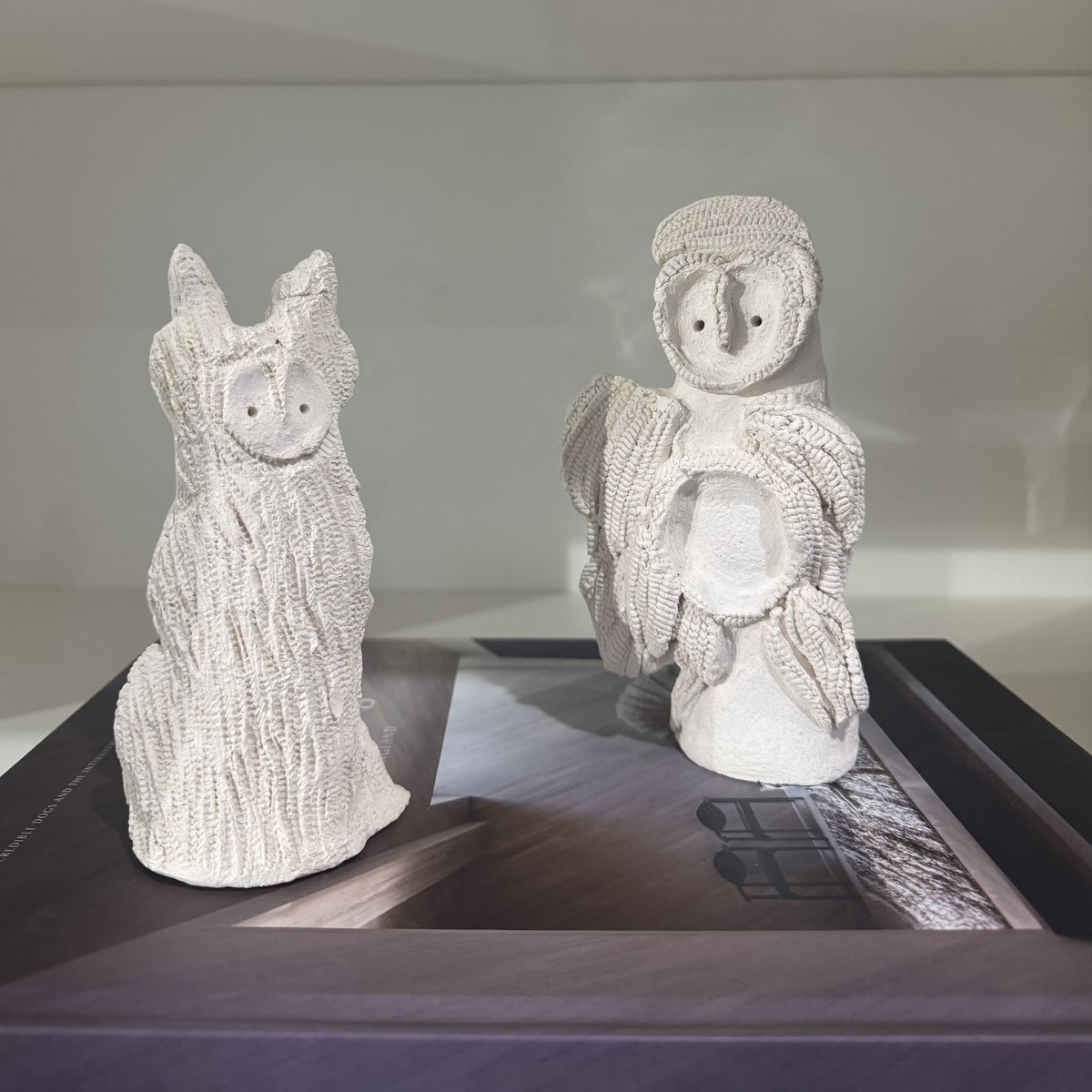 original white textured 
ceramic owls by Nadia Robertson artist
