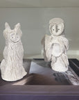original white textured 
ceramic owls by Nadia Robertson artist
