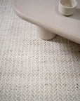 Close-up of a textured beige rug 