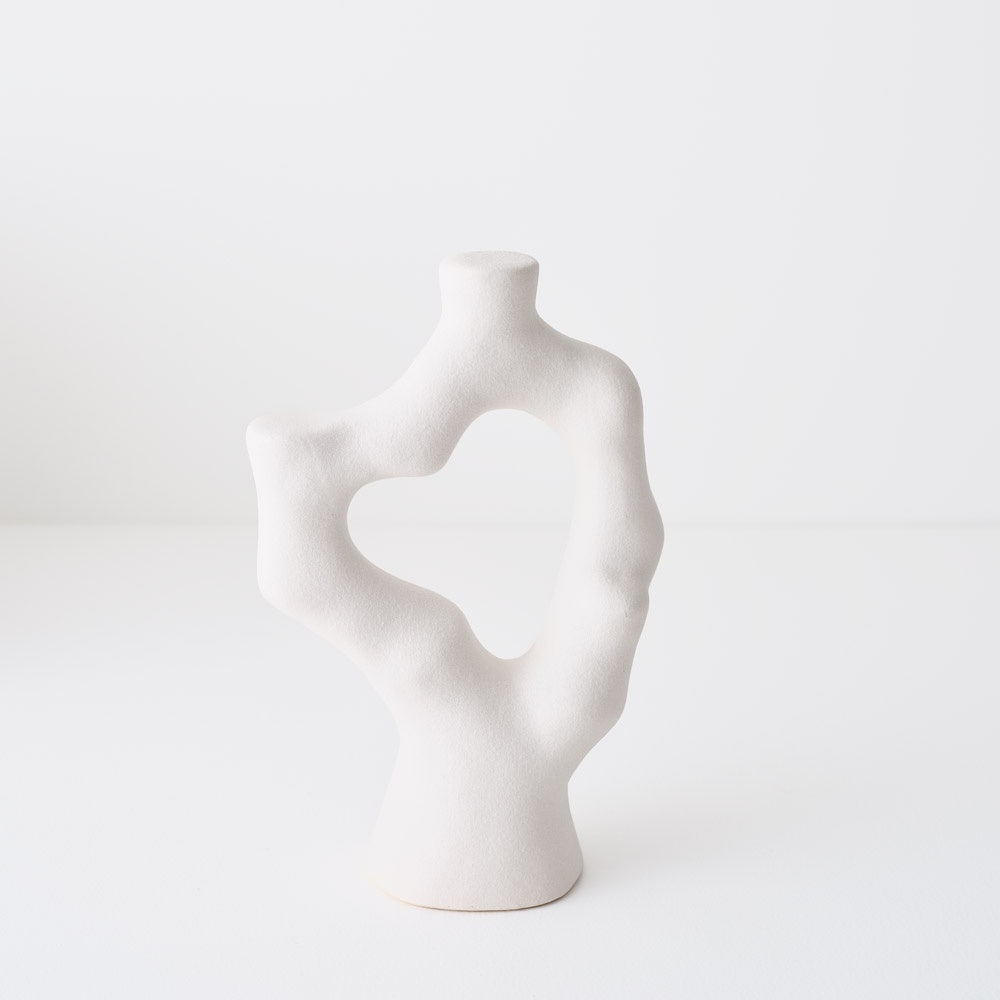 White abstract vase with a heart design