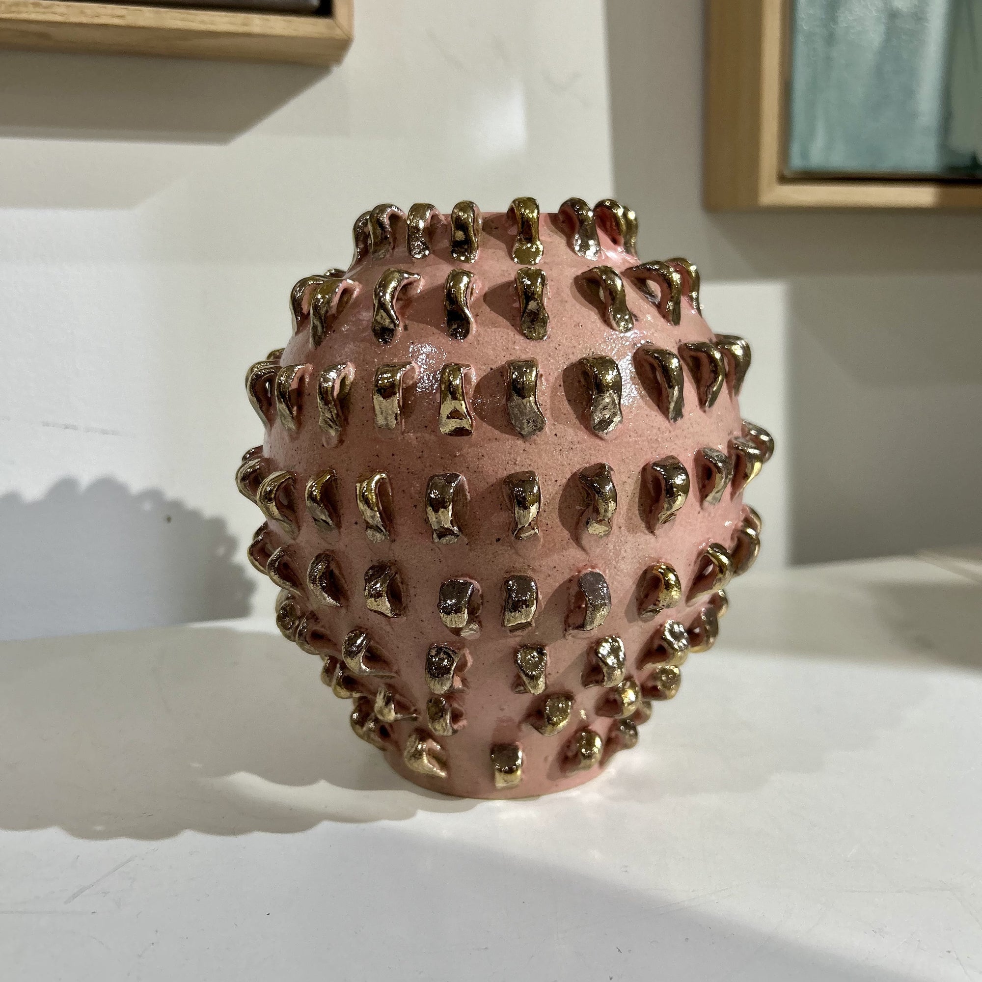 Ceramic vase by artist Juyeon. Clay glaze with gold details.