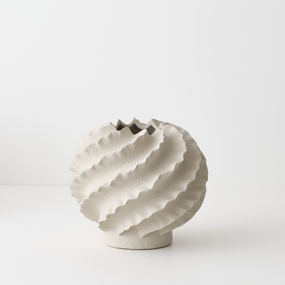 Textured ceramic vase with a spiral design