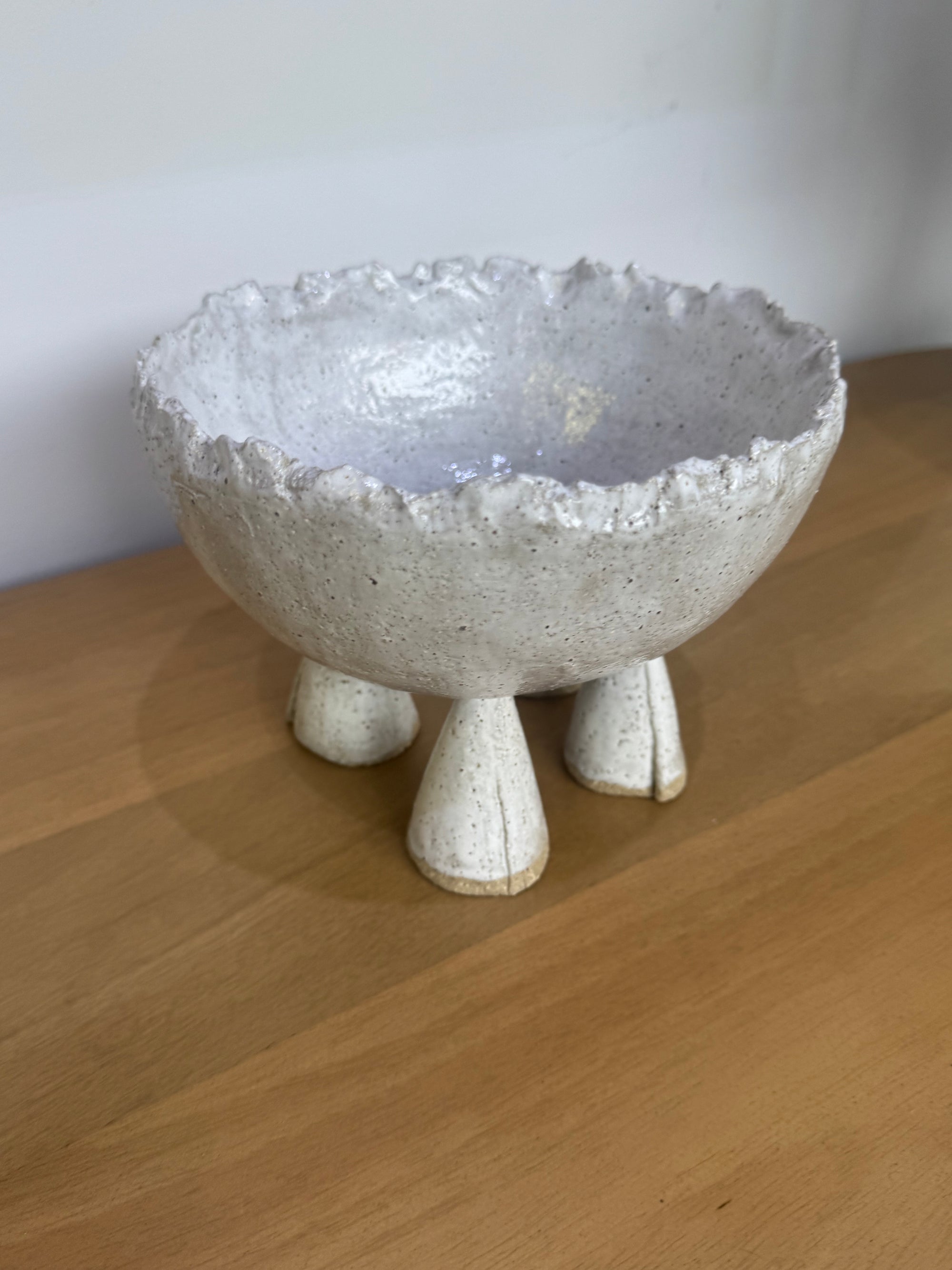 ceramic footed bowl with textured rim by the artist Nadia Roberston