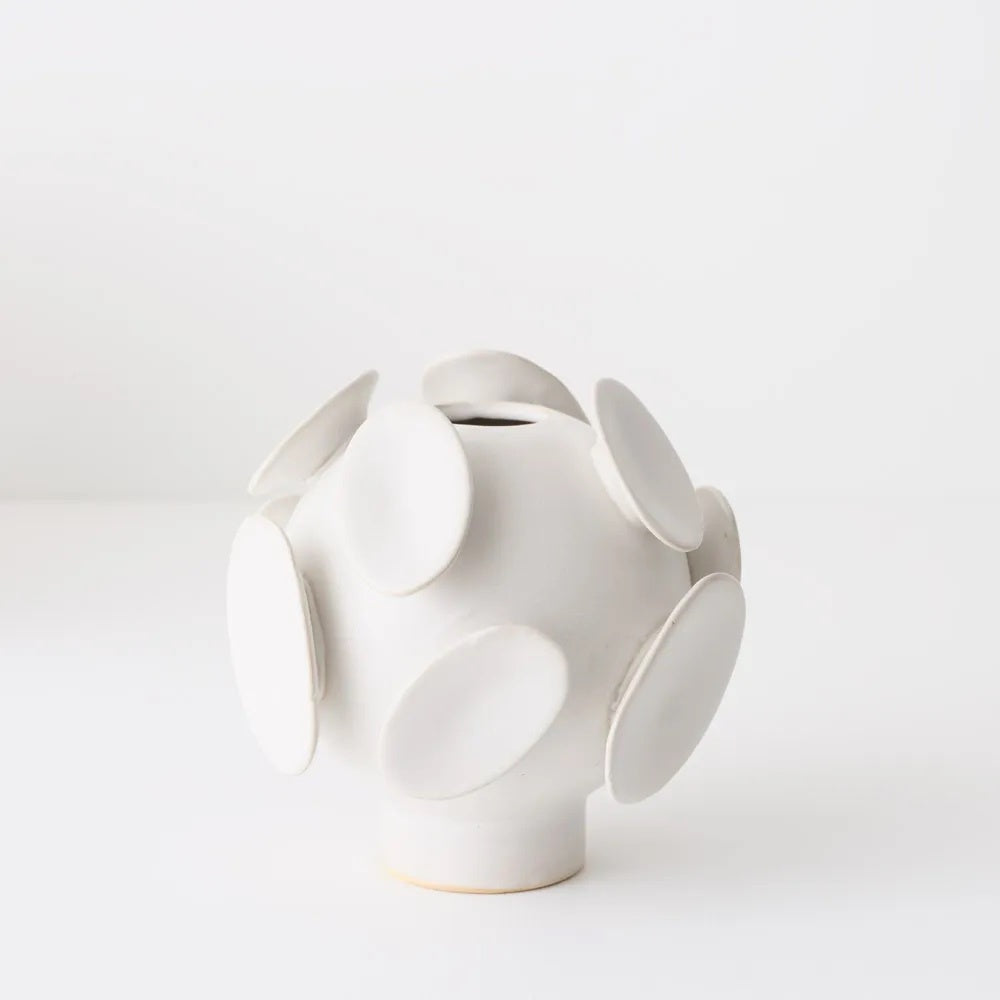 White ceramic vase with abstract design 