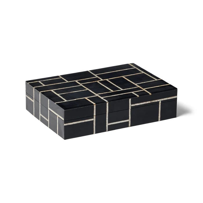 The Omari Box Rectangle. This striking design is handcrafted from black resin with a natural etched horn inlay in a grid pattern. It effortlessly &amp;amp; neatly stows your precious &amp;amp; small items while lending a sophisticated, cultured look. 
