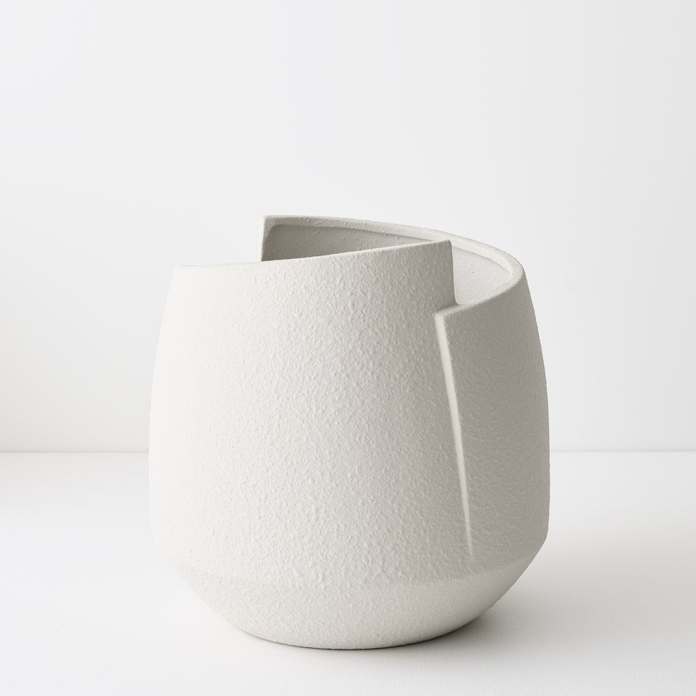 White textured ceramic pot with geomteric design detail