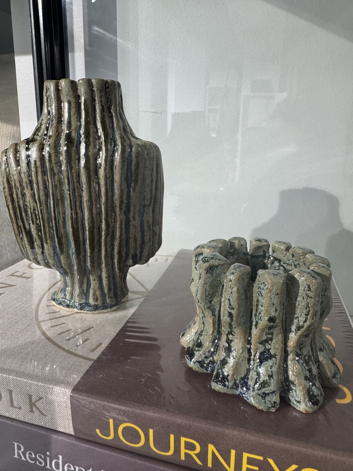 textured and ribbed ceramic vessel with blue green gaze by Nadia Robertson artist