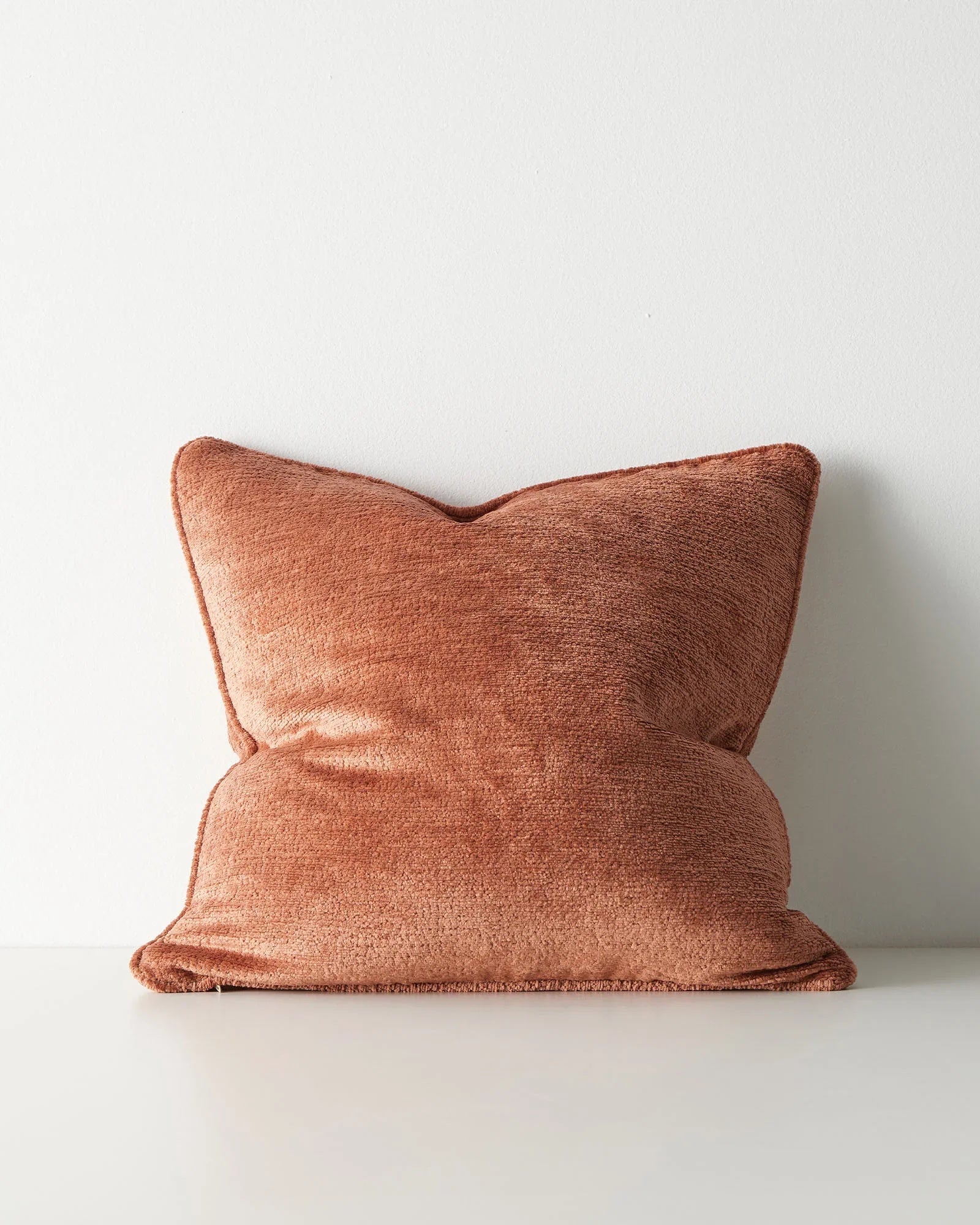 burnt orange textured cushion 