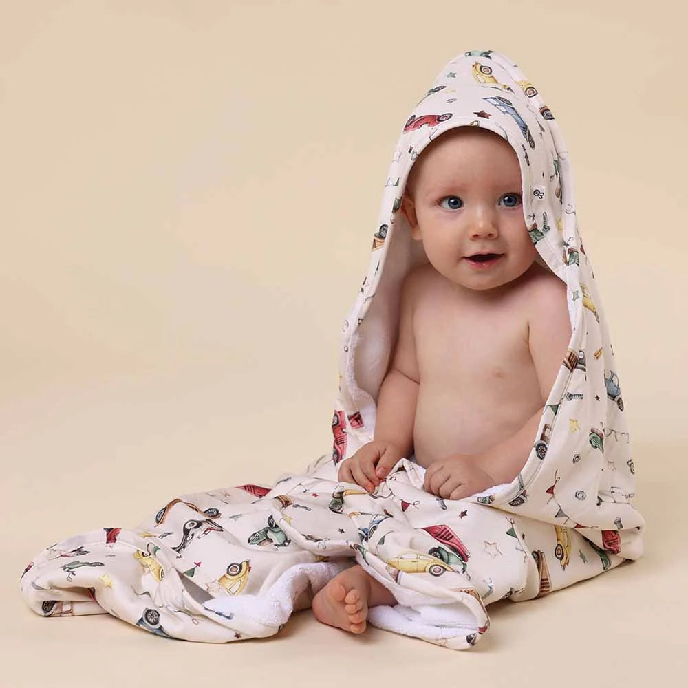 hooded towel featuring vintage car print design on beige background