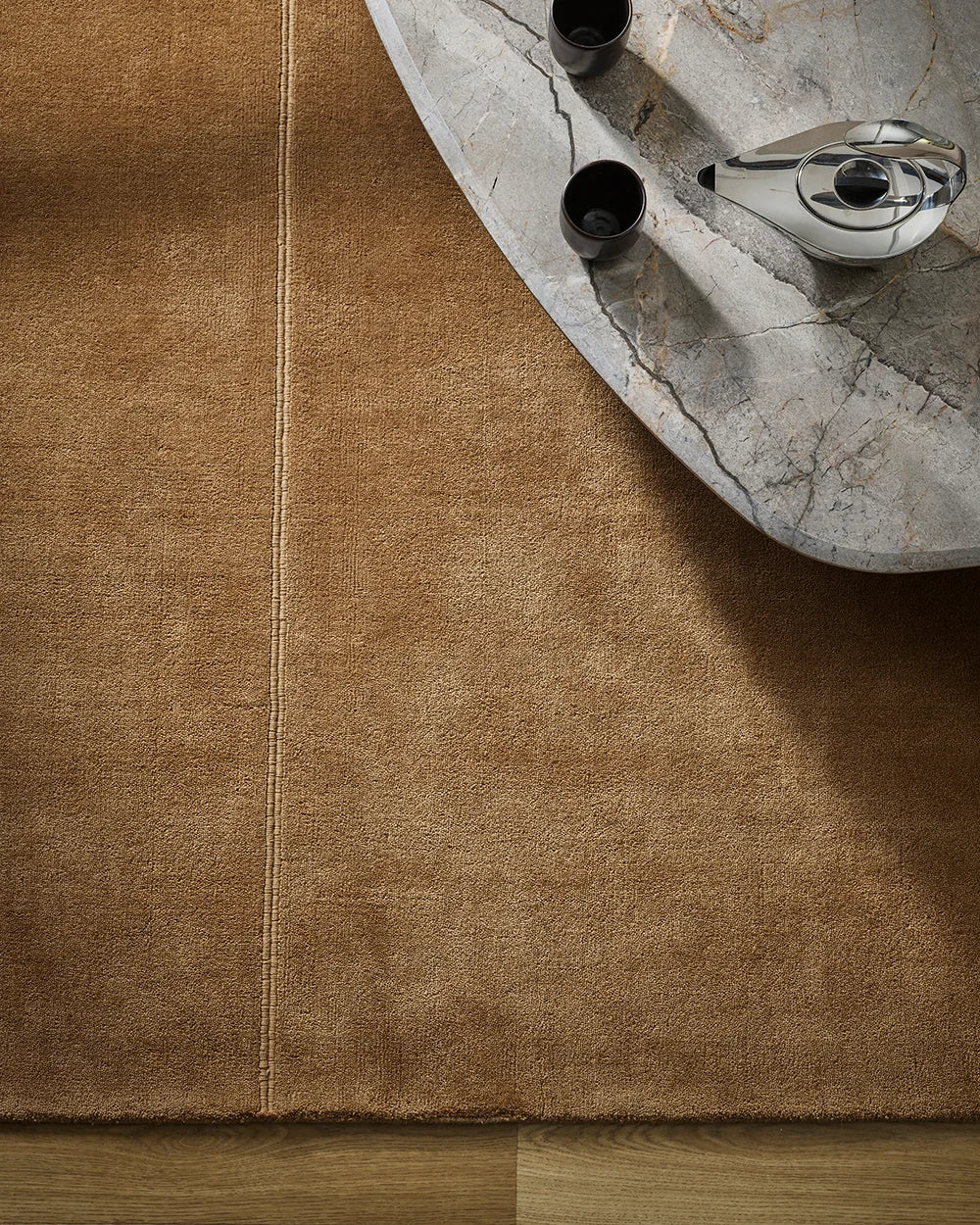 bastian rug in hazelnut tone.