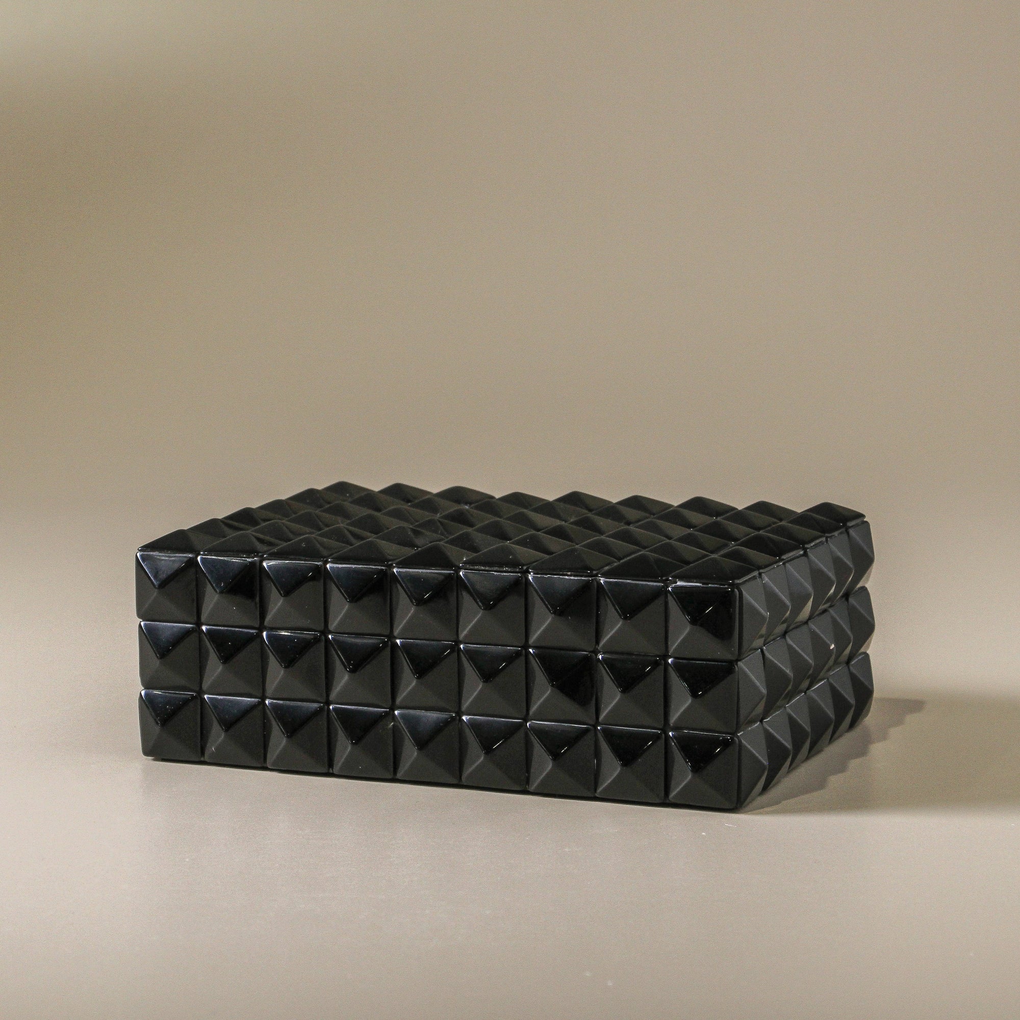 Black textured  geometric rectangular box with lid.