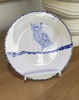 ceramic wall plate featuring blue cosmic owl by artist Nadia Robertson
