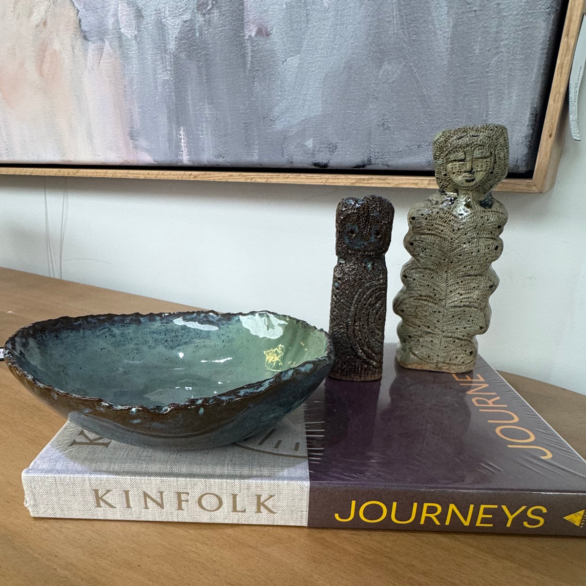 organic shaped bowl glazed in a blue green tone