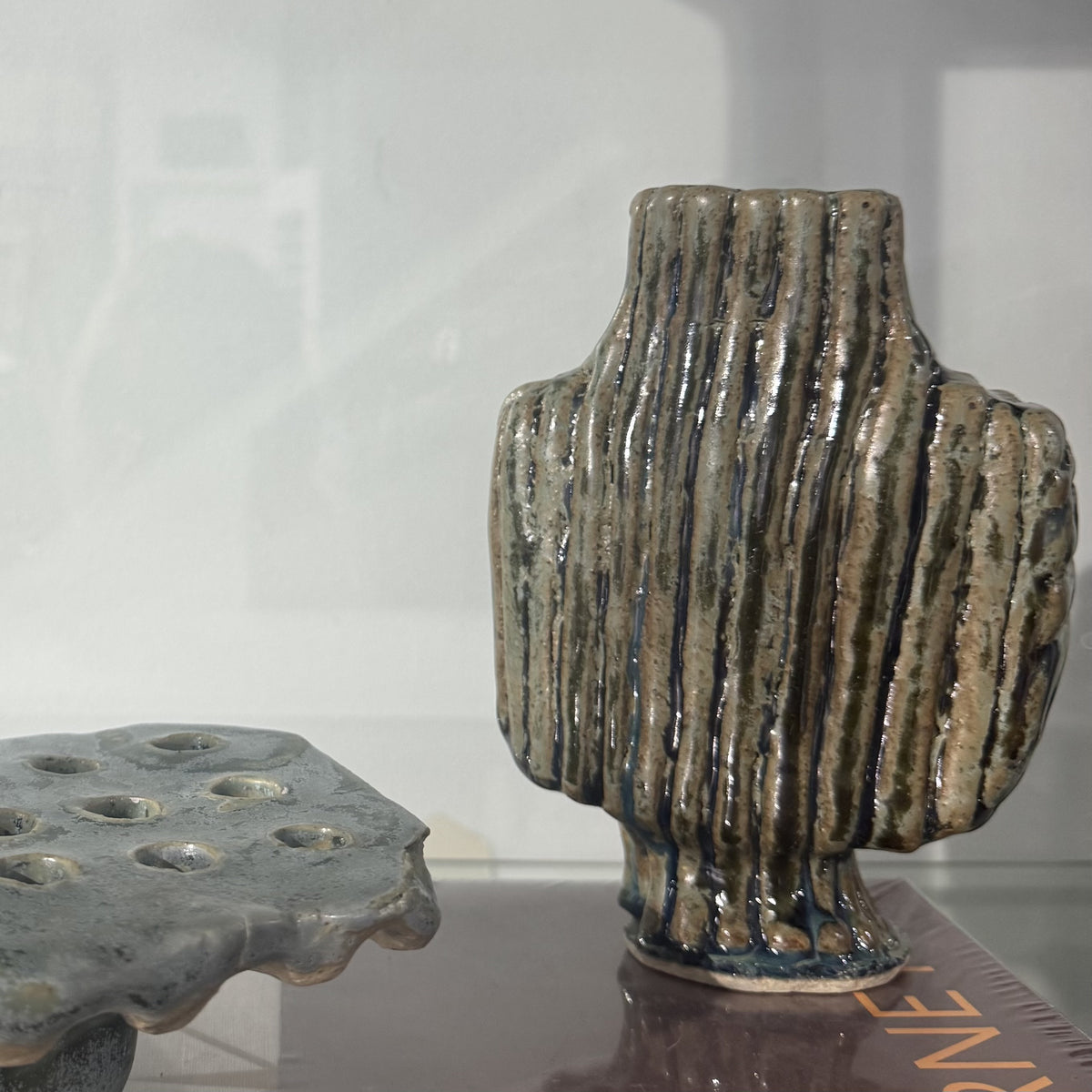 original ceramic ribbed vase glazed in green and blue tones