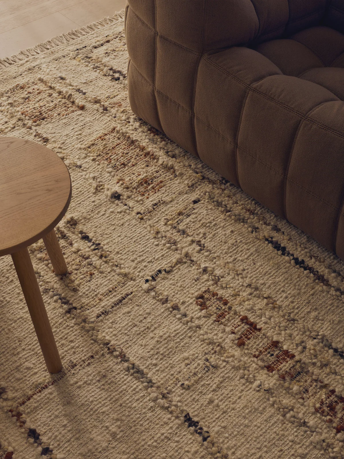 tribe home Rama rug features a geometric pattern and is textured.