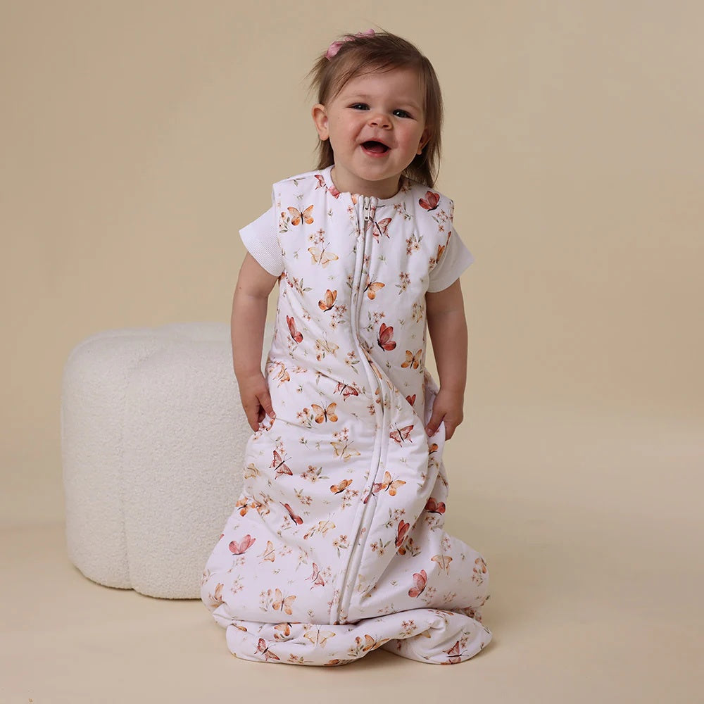 sleeping bag featuring butterfly print design on white background