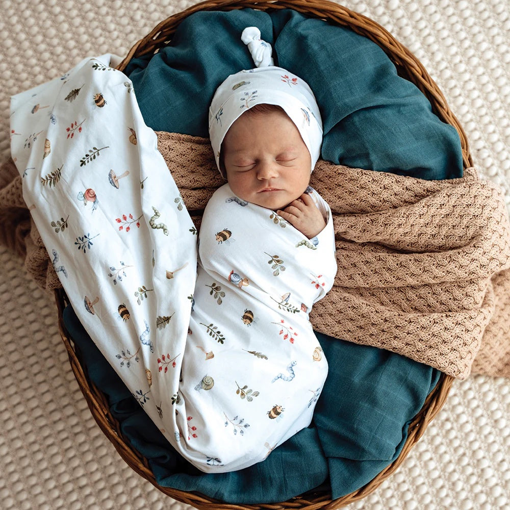 Baby jersey wrap set featuring garden friend print